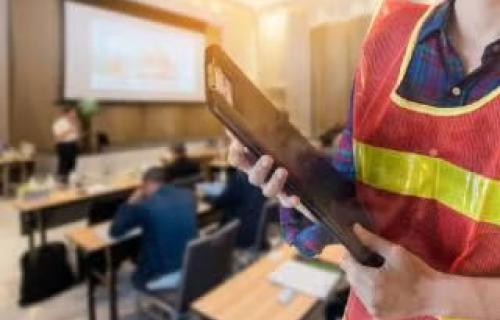 an eh&s compliance officer checks on a campus classroom